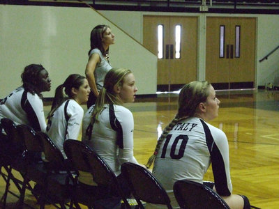 Image: Coach Heather Richters and the Lady Gladiators watch the exciting game.