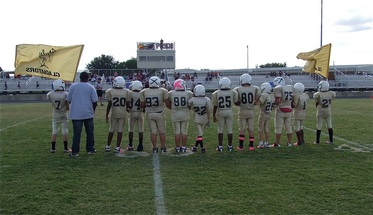 Image: A display of IYAA A-Team unity during the coin flip.