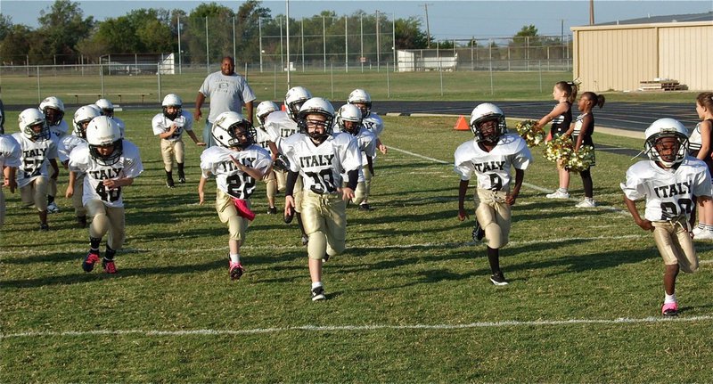 Image: The IYAA C-Team (K-2nd grades) sprints into action against the Mildred Eagles.
