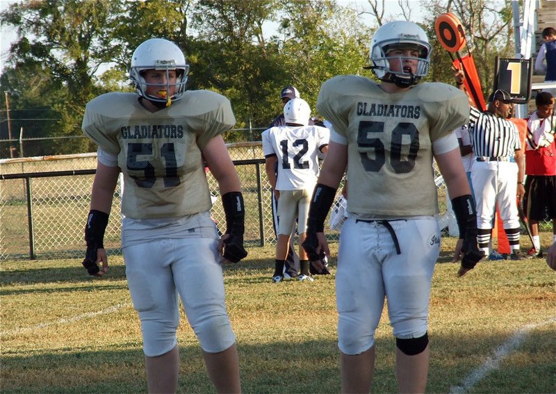 Image: Austin and Aaron Pittmon make a four-man front for the Jr. High Gladiators.