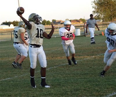 Image: Marvin Cox(10) comes out throwing and completes a pass to Shad Newman.