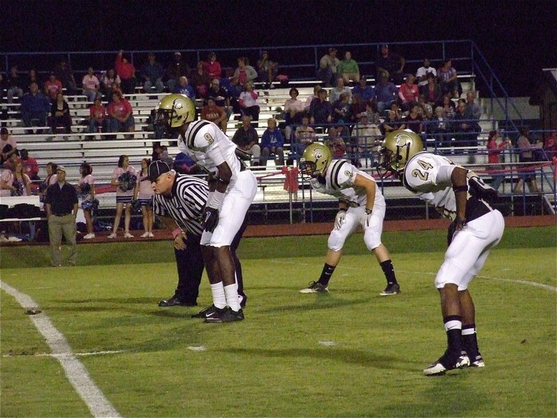 Image: Devonta Simmons(9), Hayden Woods(8) and Eric Carson(24) have combined for several interceptions in the secondary this season and Simmons snagged another pick Friday night.