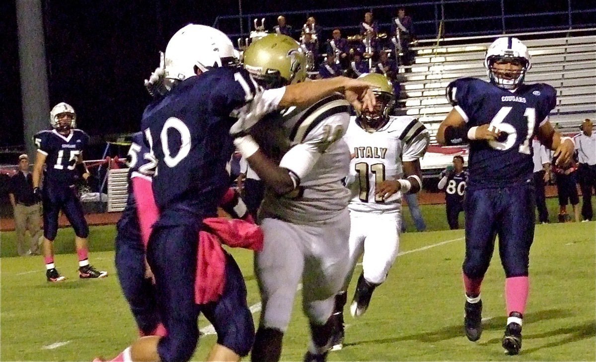 Image: Gladiator linebacker Ryheem Walker(10) greets Kirby Watson(10) as the Cougar QB passes to force an Italy interception by free safety Devonta Simmons. Hello!