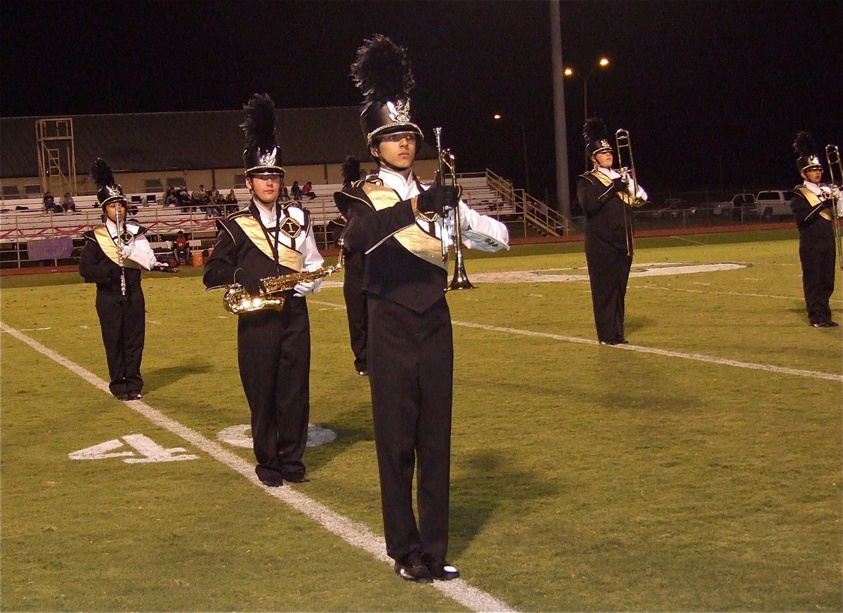 Image: Adam Michael joins his fellow Gladiator Regiment Marching Band members in wowing the Leon fans during the halftime show. Leon’s band had a great sound as well.