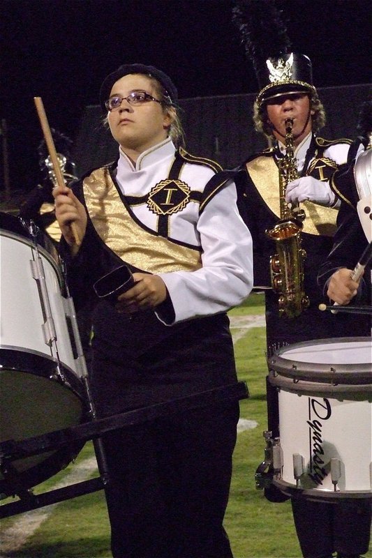 Image: JoeMack Pitts plays the sax while Reagan Adams gives the Leon faithful more cowbell. Gotta have more cowbell!