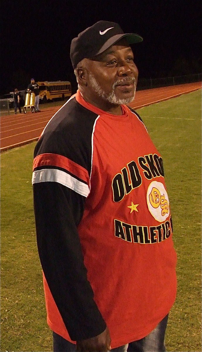 Image: Ervin Green, the grandfather of Gladiator cornerback/receiver Eric Carson, enjoys the game from the sideline.