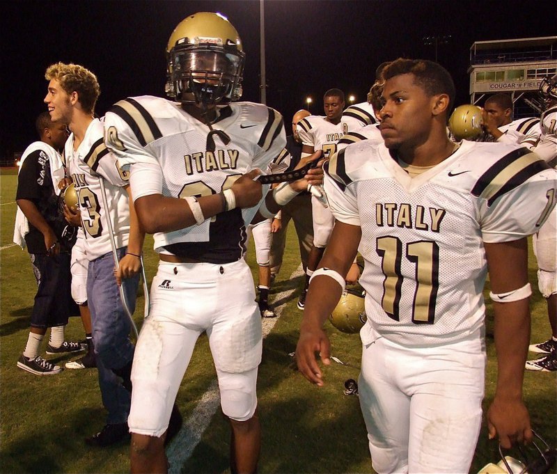 Image: Brandon Souder(63), Trevon Robertson(20) and Jamal Lewis(11) are feeling good after their 36-17 win over Leon.