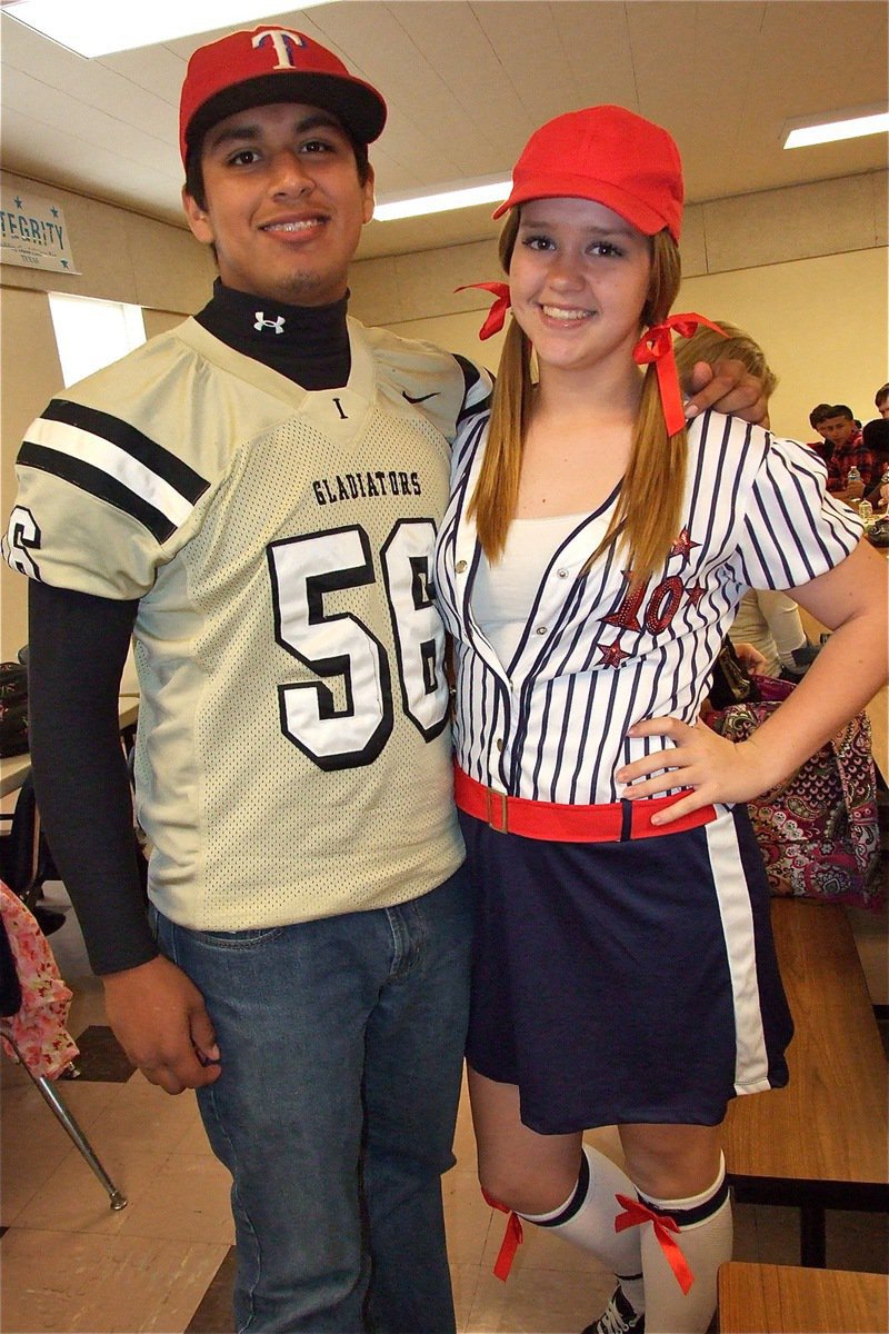 Image: Omar Estrada plays the role of himself, an All-World football player that supports the Texas Rangers, while Paige Westbrook is a foul ball catching diva.