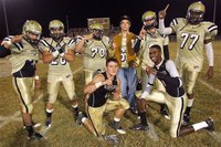 Image: Senior Gladiators Omar Estrada(56), Kyle Jackson(28), Isaac Medrano(70), Brandon Souder(63), Jase Holden(3), Larry Mayberry, Jr.(77), Ethan Saxon(44) and Devonta Simmons(9) pose after defeating the Axtell Longhorns 36-26 in what would be the final home game for these classmates.