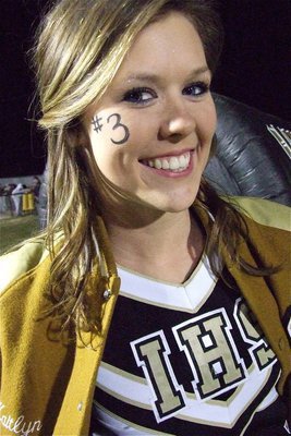 Image: IHS Cheerleader, Kaitlyn Rossa, supports her beau and Gladiator quarterback, Jase Holden(3).