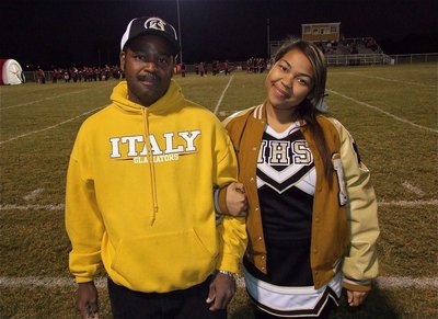 Image: Senior IHS cheerleader, Destani Anderson, is introduced along with her uncle, Patrick Anderson.