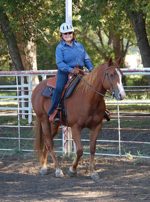 Image: Sandy Neal of Italy and her horse Miss Specialty won the mares at halter class and placed second in western walk trot.
