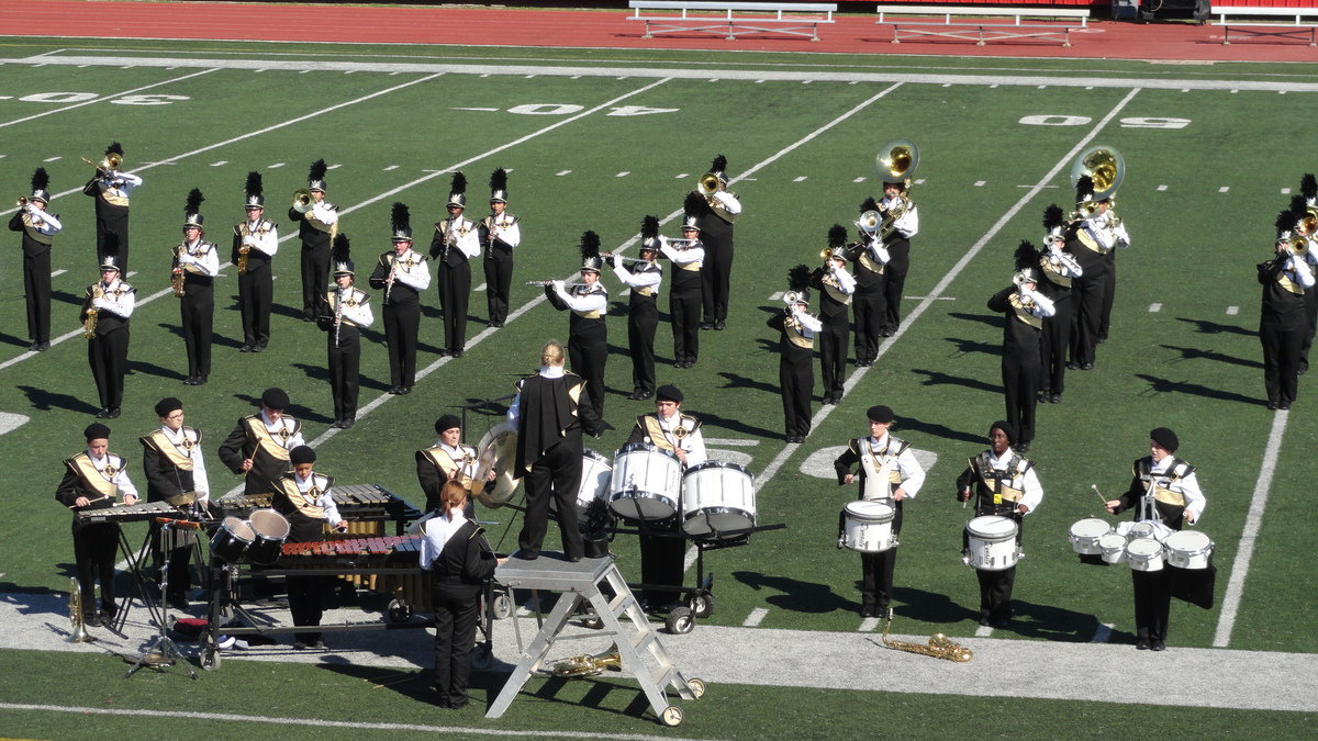 Image: Drum Major Drenda Burk leads the Italy Gladiator Regiment Band.