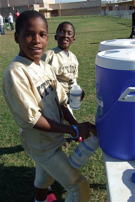 Image: IYAA B-Team stars Al Waits and Jaylon Davis keep the water filled for the C-Team Gladiators.