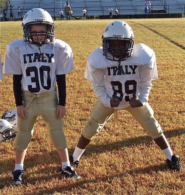 Image: IYAA C-Team defensive linemen, Isaac Gray(30) and Byron Davis(99), are ready for their team’s game against the Dawson Bulldogs.