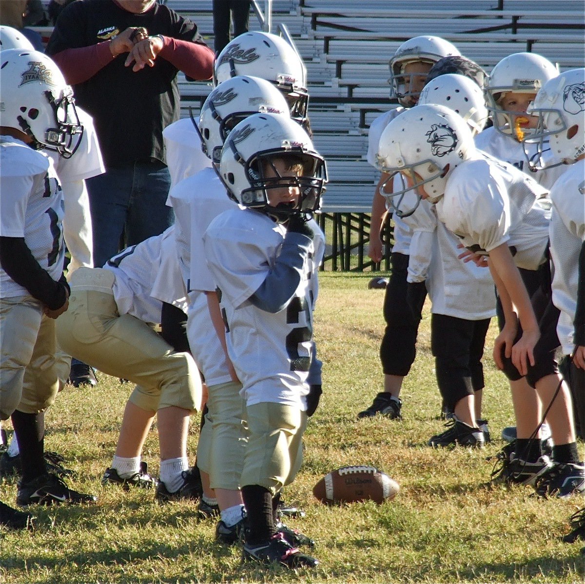 Image: C-Team tight end Dustyn Rose(22) checks the down and distance needed for a first down.