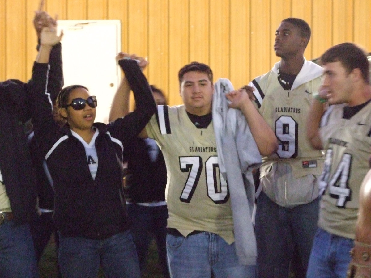 Image: Italy Gladiators gather together at the pep rally and bonfire Thursday night.