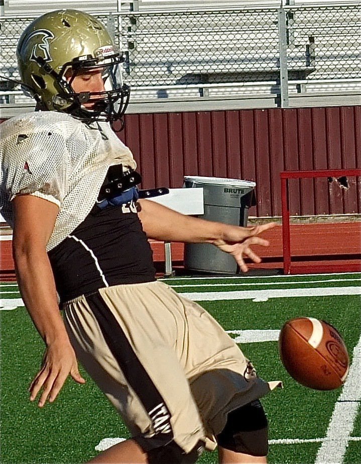 Image: Kyle Jackson takes a practice punt.