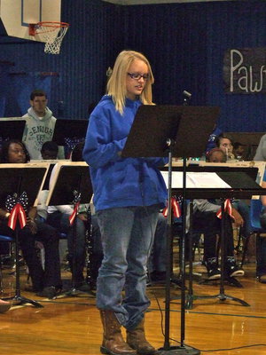 Image: Caitlin Tucker reciting Remembering our Veterans.