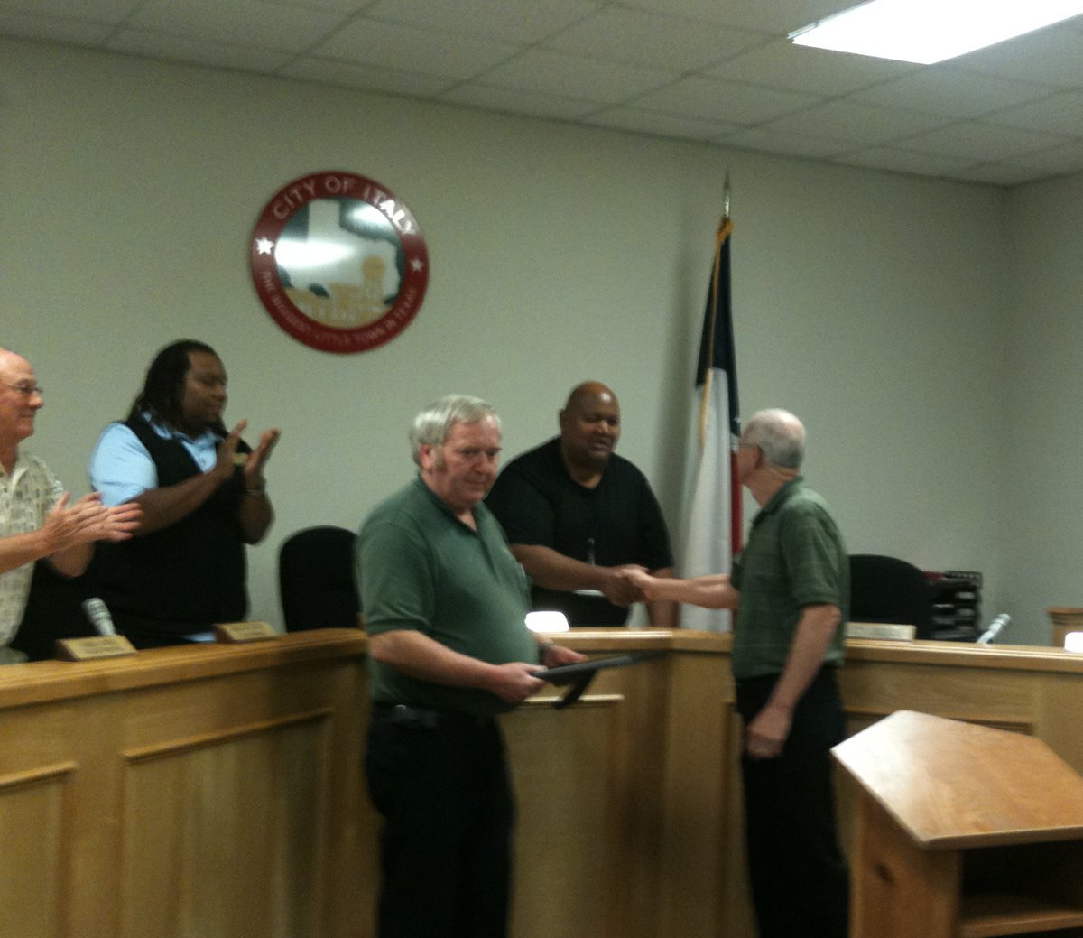 Image: Greg Richards and Frank Jackson present Ronnie Dabney with framed proclamation 