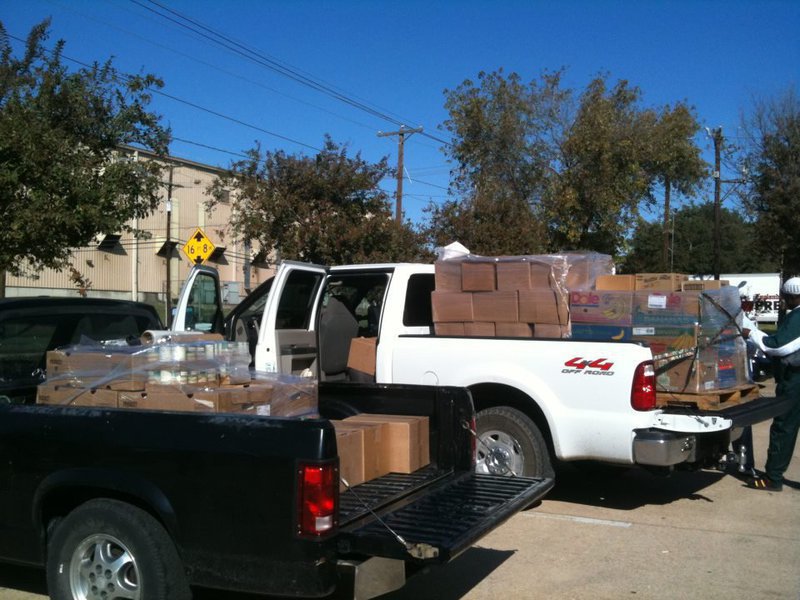Image: IMA volunteers go to Dallas to pick up food each month.