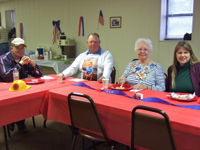 Image: Donovan Scott, Ron Scott, Billie Buchanan and Lavon Brach all members of Italy Church of Christ taking a break from cooking and enjoying some breakfast.