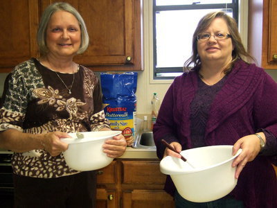 Image: Cherrie Scott and Kim Zambrano – members of Italy Church of Christ whipping up some delicious pancakes.