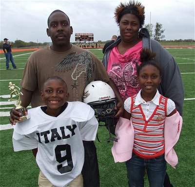 Image: Proud family! John Hall, Sr. and his wife, Latoya, pose with their children, John Hall, Jr. and daughter Jaliyah.