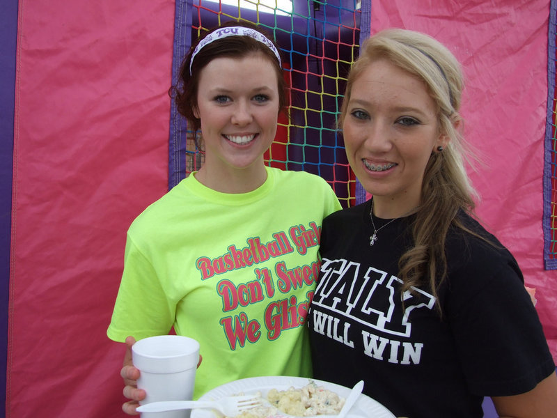 Image: Kaitlyn Rossa and Megan Richards, both Italy High School seniors and NHS members, help with the bounce houses.