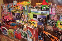 Image: Toys to be raffled away during the Italian Festival began stacking up.