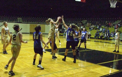 Image: Halee Turner(5) steals the ball from a Lady Cat.