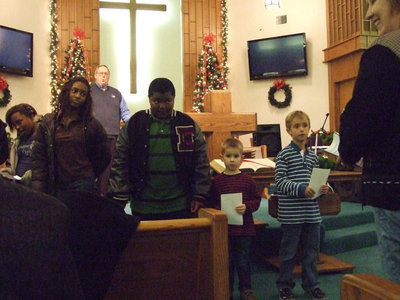 Image: The Community Children’s choir sang special music under the direction of Kim Varner.