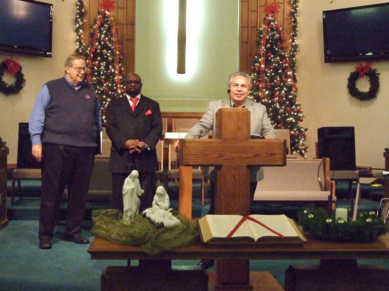 Image: Pastor Morgan, Pastor Dixon and Pastor Martinez stand together during the Christmas serve on Sunday.