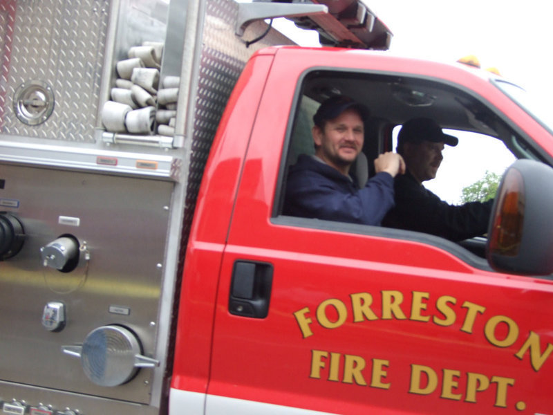 Image: Forreston Volunteer Fire Department cruised Main Street during the parade.