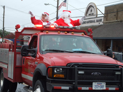 Image: Our friends from the North Pole wave hello and thrill the crowd.