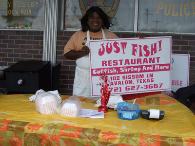 Image: Matila, owner of Just Fish in Avalon, was serving fried catfish and wings on Saturday.  Yum!