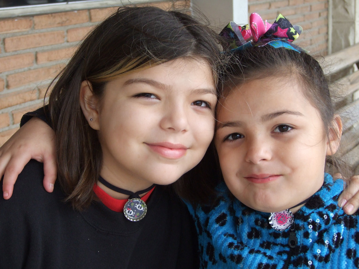 Image: Lexie and Skylar Delarosa wanted a picture at the festival on Saturday.