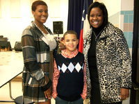 Image: Sierra Brown (Camisha’s cousin), Dylan Monk (Camisha’s son) and Teresa Brown (Camisha’s sister) were ready for the program to get started.