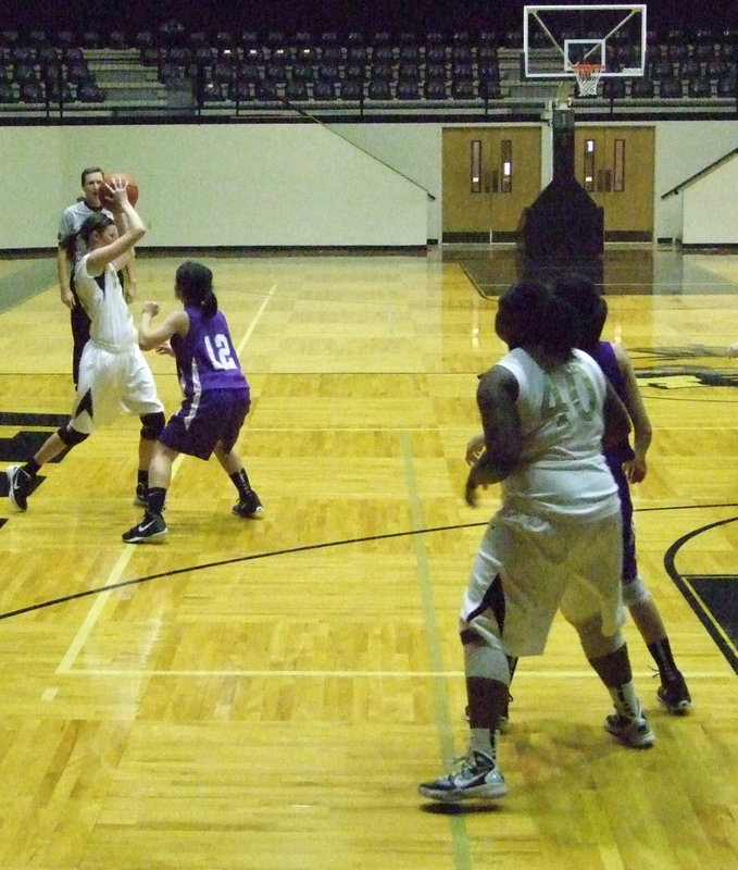 Image: 
    	Kaitlyn Rossa plays keep-away from this Lady Rattler.
    