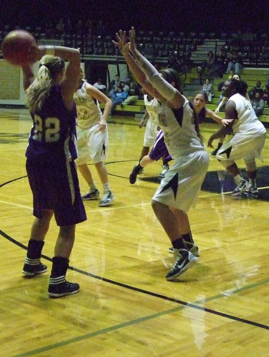 Image: 
    	Alyssa Richards won’t give any space to Tolar’s #22 Frazier.
    