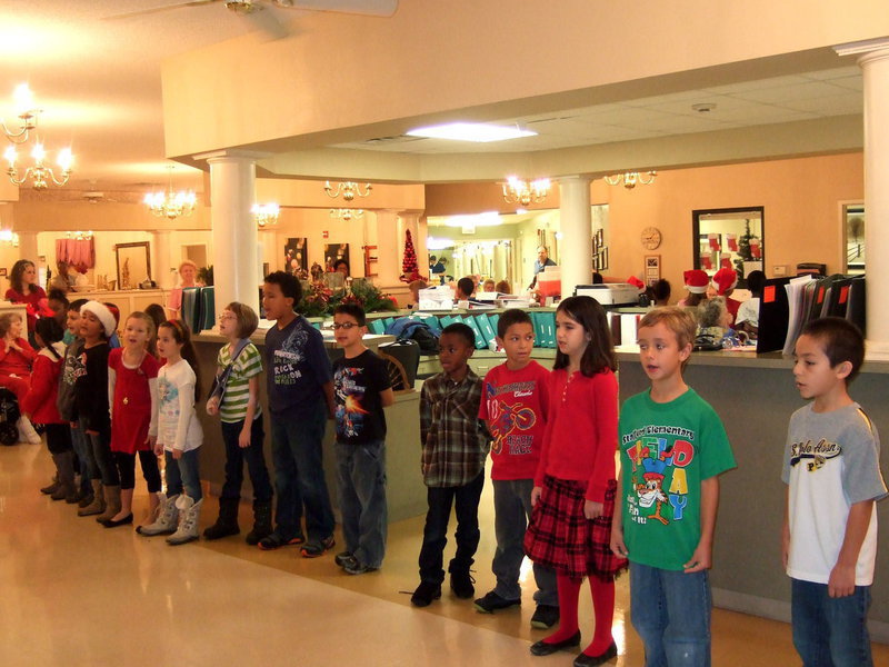 Image: Stafford 2nd graders singing Feliz Navidad.