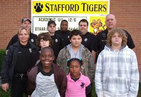 Image: Italy Police Officers and Stafford Elementary students are ready to do a little Christmas shopping in participation with the I.P.D. sponsored “Shop with a Cop” program. Back row: Officer Shawn Martin, Officer Daniel Pitts, Stafford Elementary Principal Miller Jason Miller, Officer Eric Tolliver and Chief Diron Hill. Middle row: Officer Tierra Mooney, Nicholas Feemster (4th grade), Austin Lowe (6th grade) and Tomi Newman (6th grade). Front row: Byron Davis (2nd grade) and his little sister Mariah Davis (1st grade). Not pictured: Animal Control Officer Shelbi Landon.
