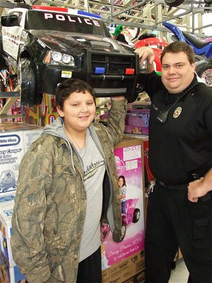 Image: All Officer Eric Tolliver wants for Christmas is a Hemi while Austin decides the money would be better spent on a bicycle. 