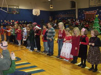 Image: First and Second graders singing Listen to the Jingles.