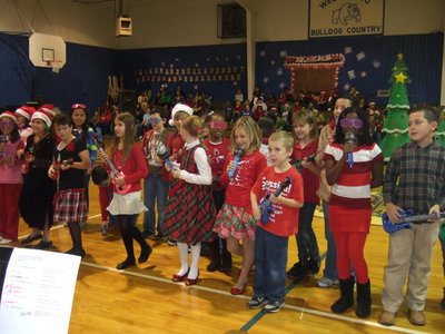 Image: Third graders singing, We Will Jingle.