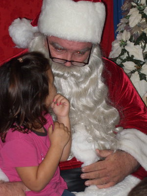 Image: Christmas secrets are being told to Santa.