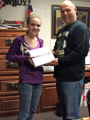 Image: Kayla Cummingham accepting the iPad from Mr. Joffre.