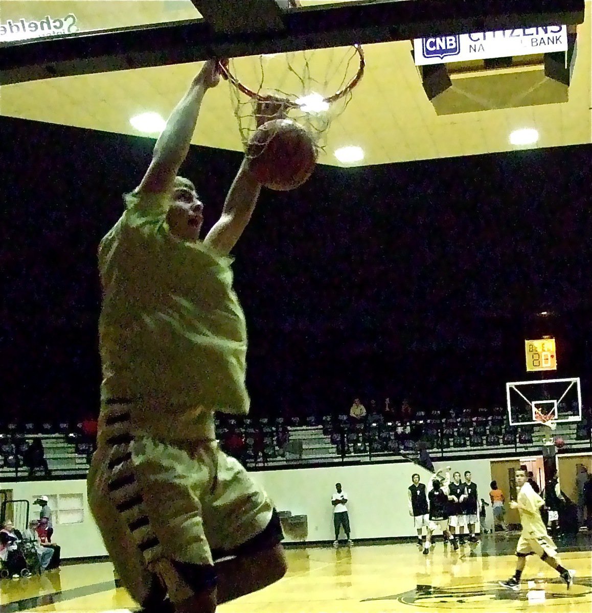 Image: Italy’s Cole Hopkins jams during the pre-game warmups before taking on Palmer.