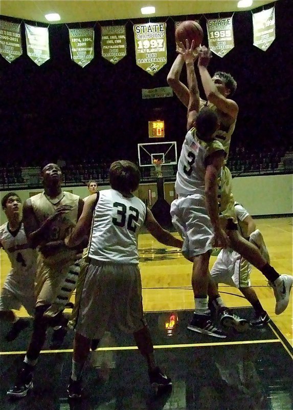 Image: Gladiator Cole Hopkins(21) soars across the lane.