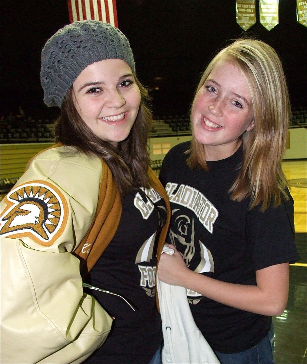 Image: Reagan Adams and Hannah Washington help keep the Gladiators hydrated during the game.